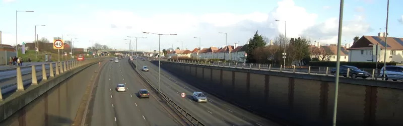 The A406 North Circular Road at Stonebridge Park was widened and grade-separated as part of an aborted major programme of urban road improvements in London in the 1980s and 1990s. Click to enlarge