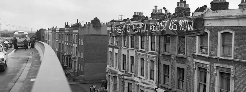 Residents of Acklam Road protest at the opening of the Westway with a banner reading "get us out of this hell, rehouse us now". Click to enlarge